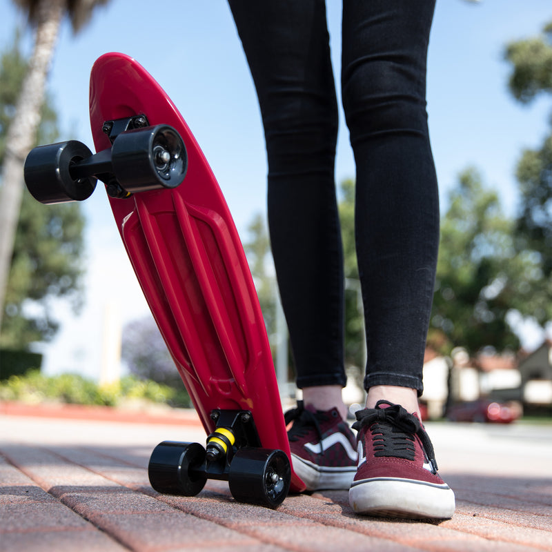 red 22-inch mini cruiser with black trucks and wheels
