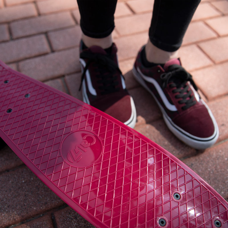 red 22-inch mini cruiser with black trucks and wheels