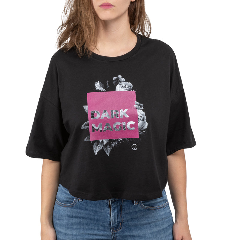 C7skates Dark Magic Crop T-Shirt features a floral and text graphic print in a relaxed, mid-length fit with a tear-away label.