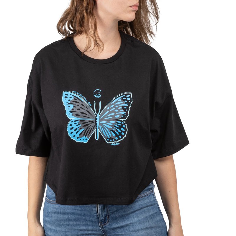 C7skates Magical Butterfly Crop T-Shirt features a blue and gray print in a relaxed, mid-length fit with a tear-away label.