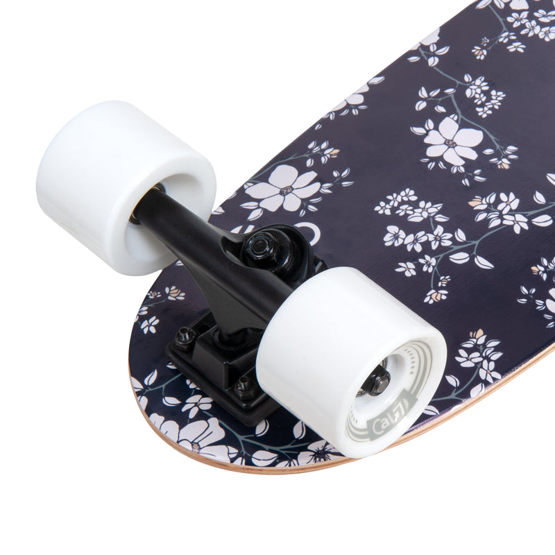 Cal 7 Meadow 22” Fishtail Mini Cruiser features a floral print graphic, 65mm 80A white wheels, black 4.5-inch wheels