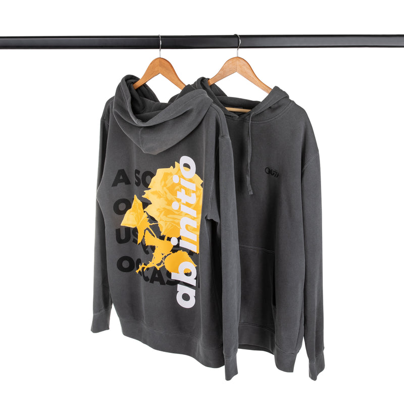 Cal 7 Latin Motto Oversized Hoodie Sweatshirt in Washed Out Black with Yellow Floral Print 