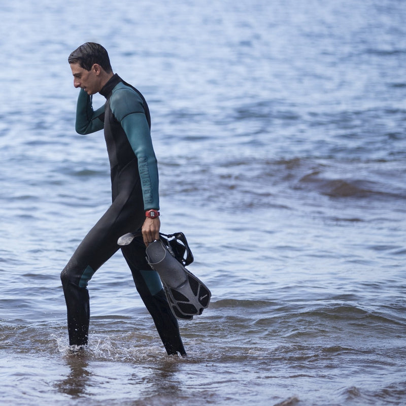 Seavenger 3mm neoprene surf wetsuit with teal sleeves